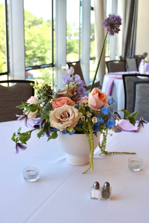 pastel wedding design includes allium, delphinium and roses