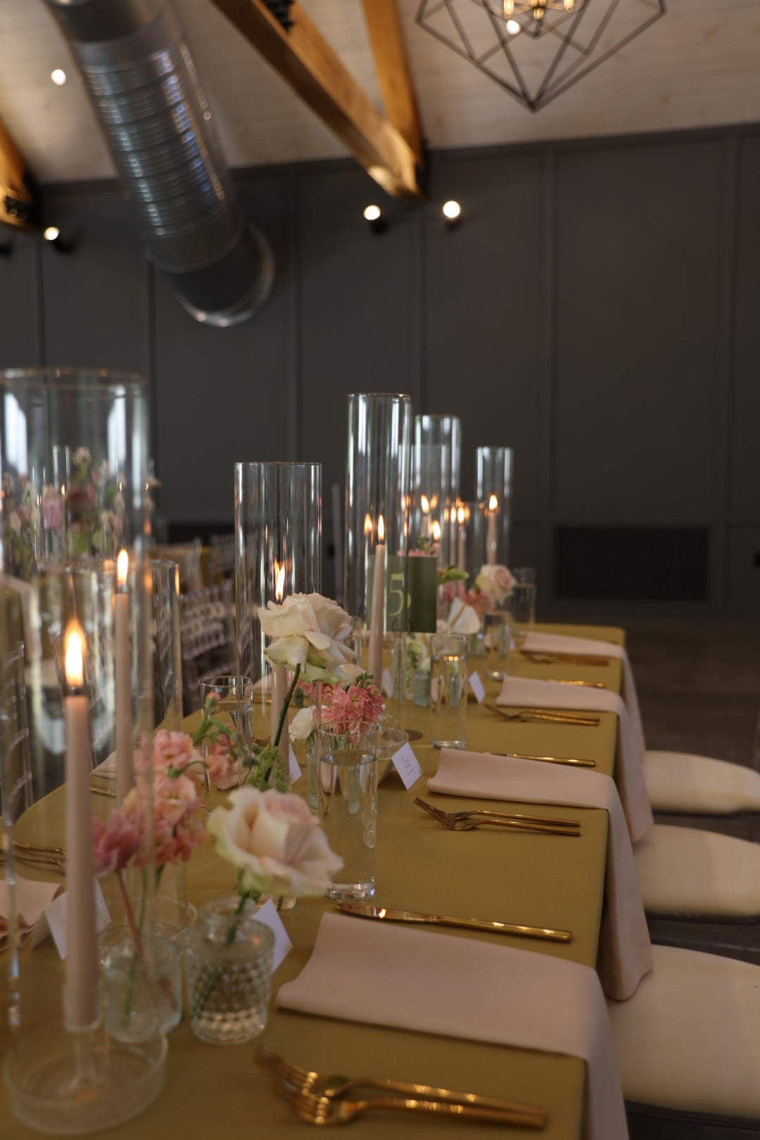 elegant and timeless bud vase and hurricane candle design