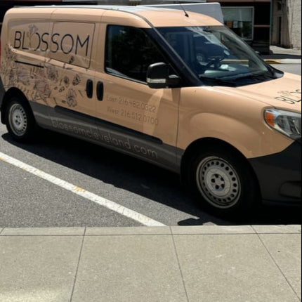 Blossom's peach colored delivery van