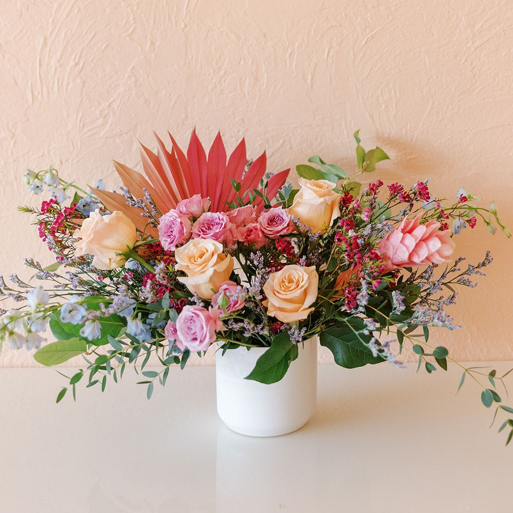 vased arrangement of colorful, healthy flowers