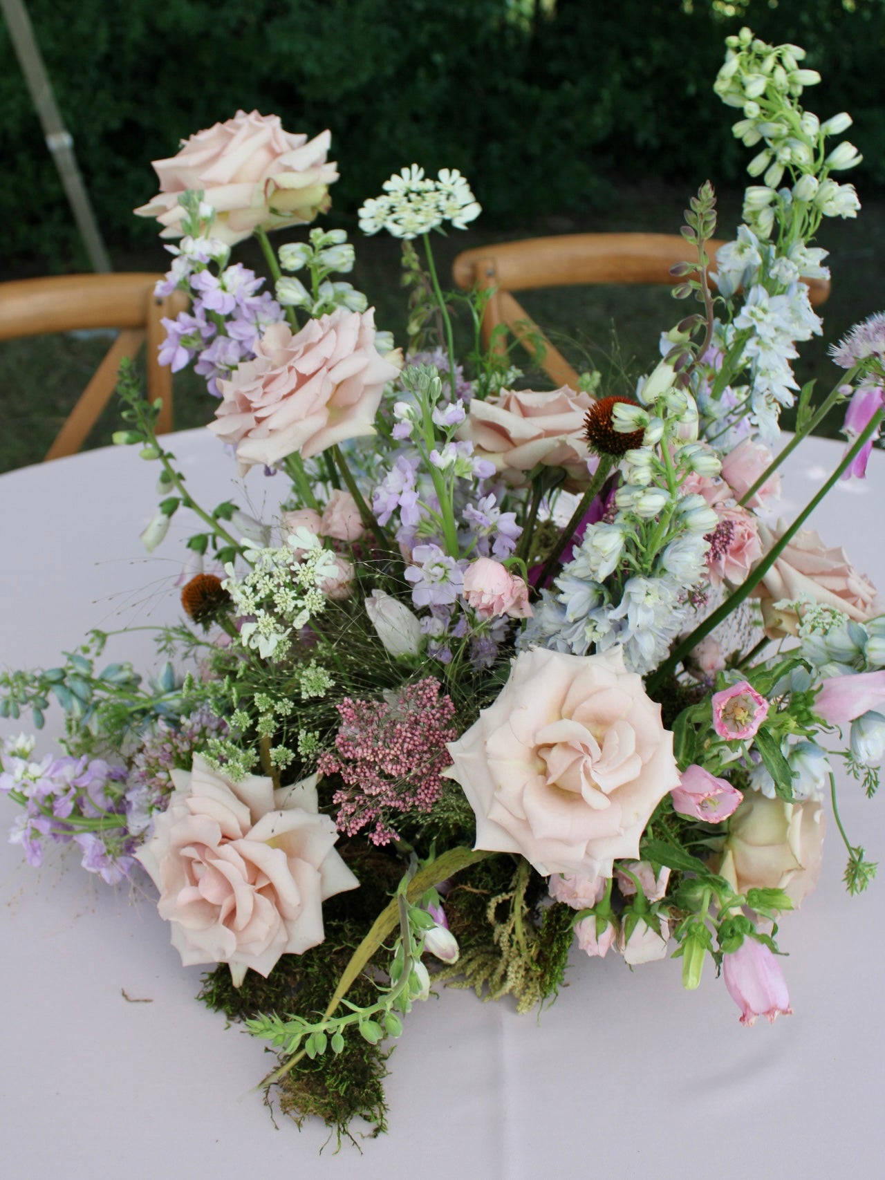 outdoor wedding reception whimsical, natural centerpiece