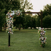 beautiful wedding ceremony arch of fresh flowers