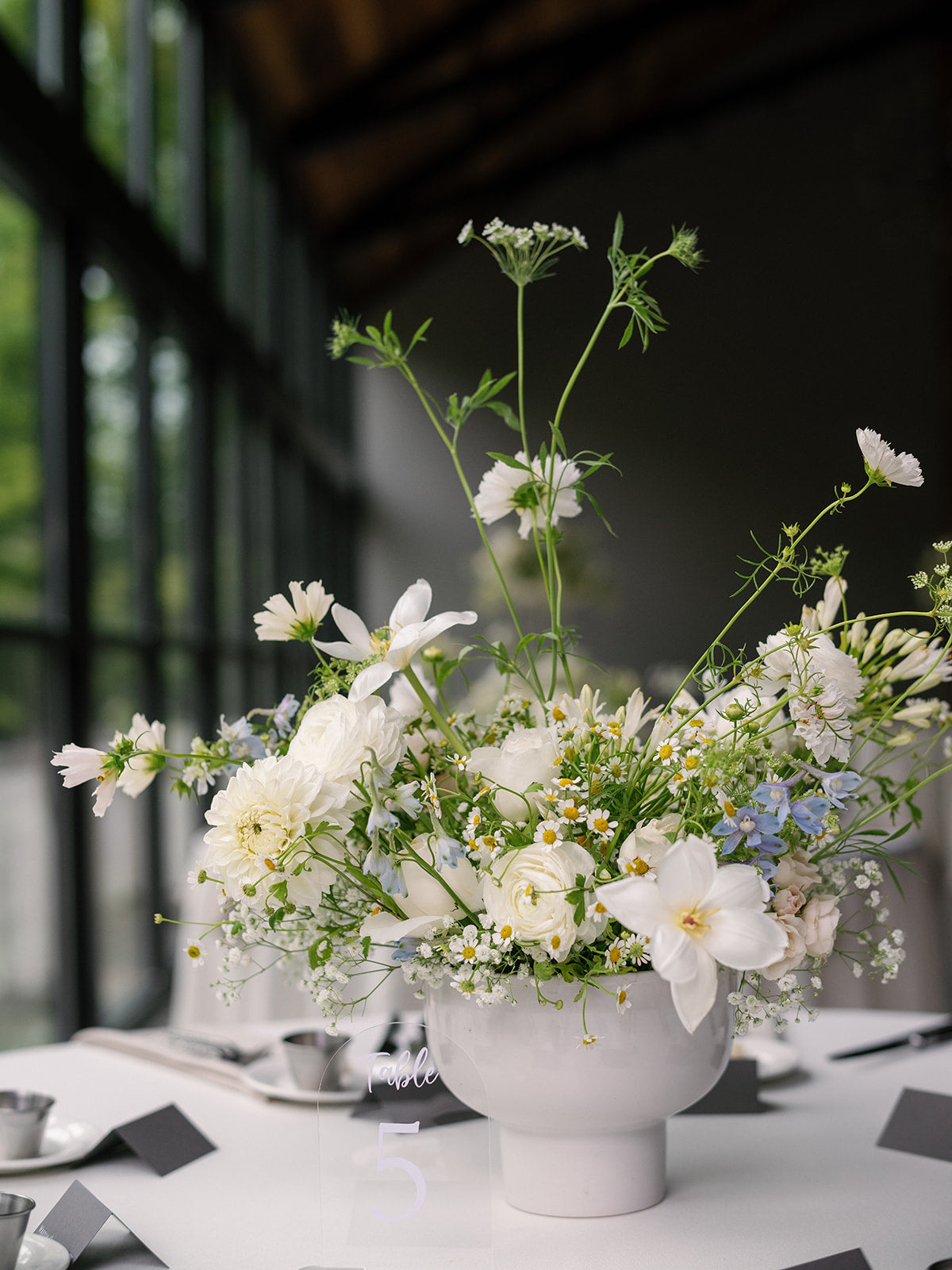 modern and whimsical seasonal wedding table with baby's breath