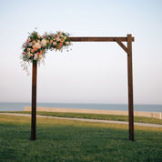 fresh flowers on a wooden arch in Ohio