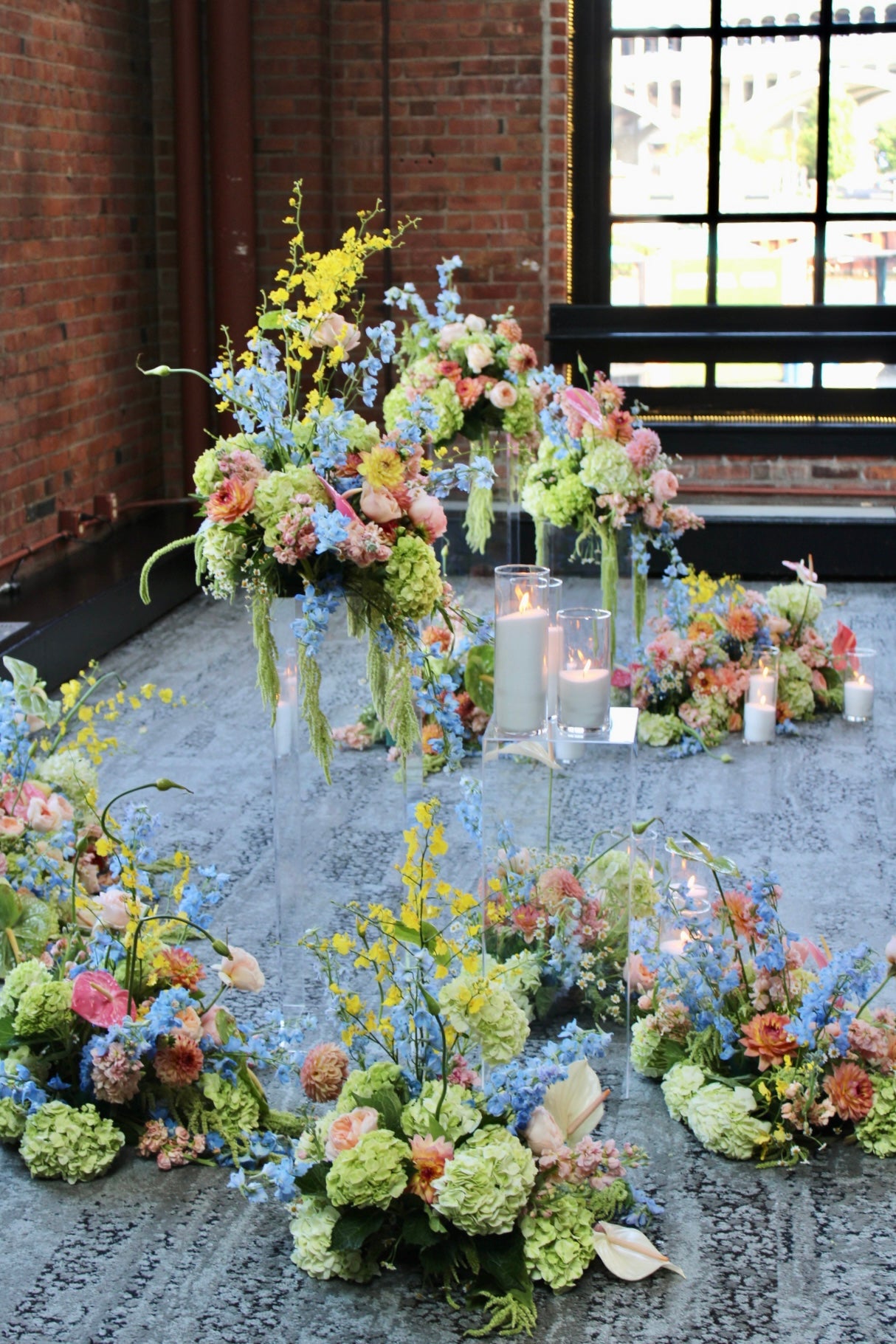 Romantic garden style indoor ceremony arrangement