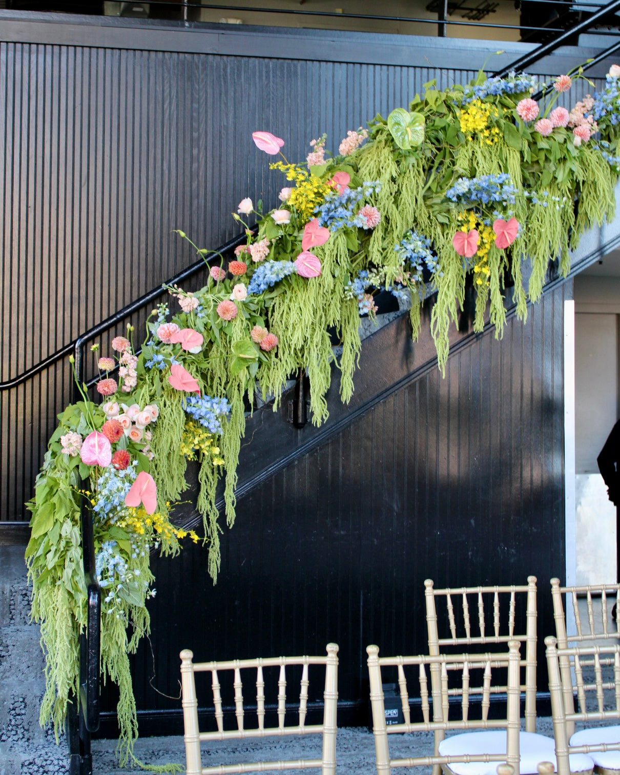 wedding reception staircase floral installation