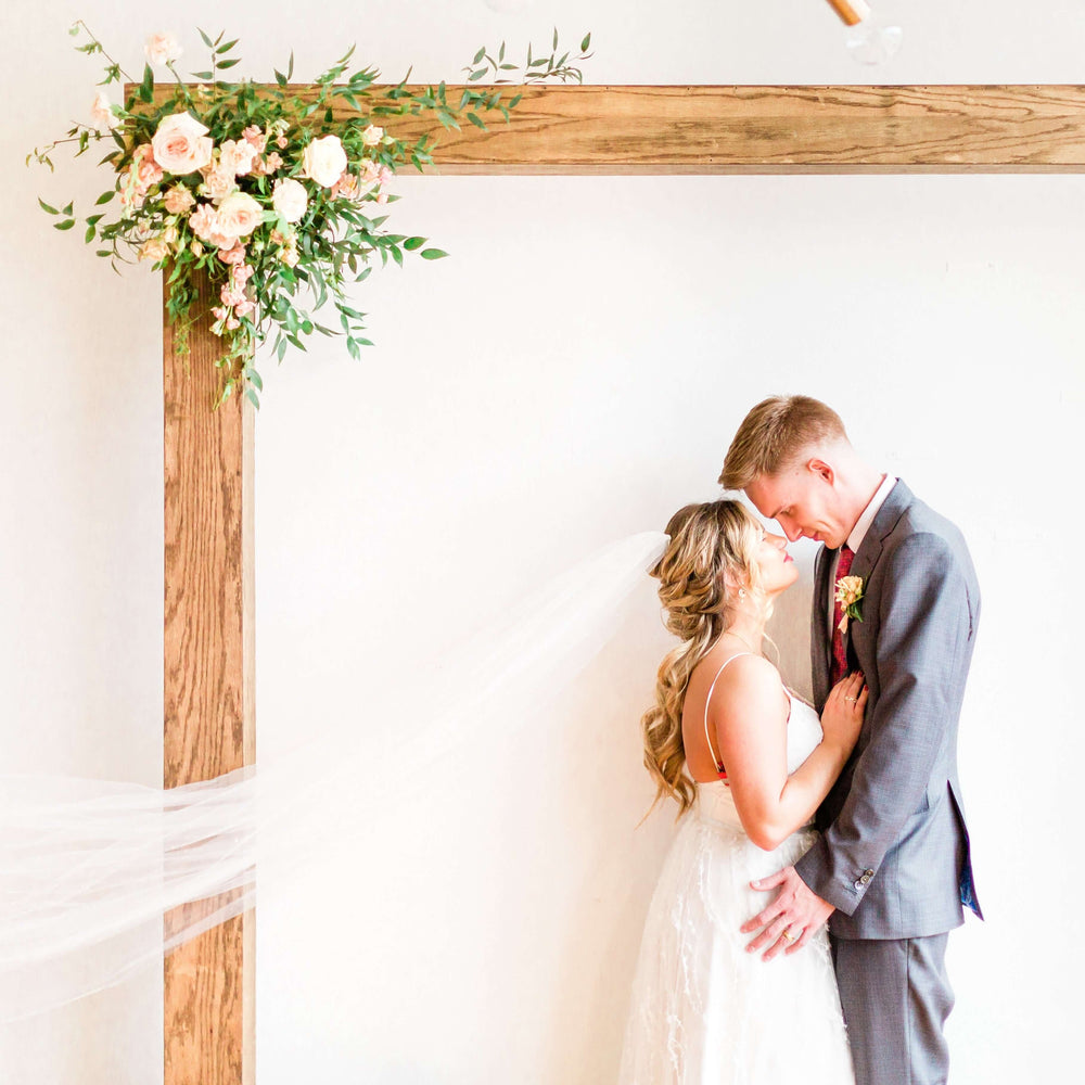 A flower adornment for your wedding altar arch