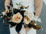 Blush rose boho bridal bouquet with magnolia leaves