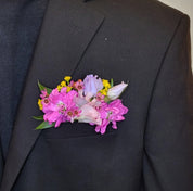 Bright pocket florals are a modern and current piece for the groom, father of the bride, groomsmen