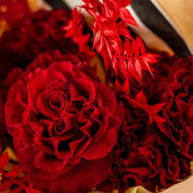 gorgeous red hearts roses accented with dried ruscus