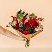 bouquet of roses in shades of red for Valentine's Day gifting