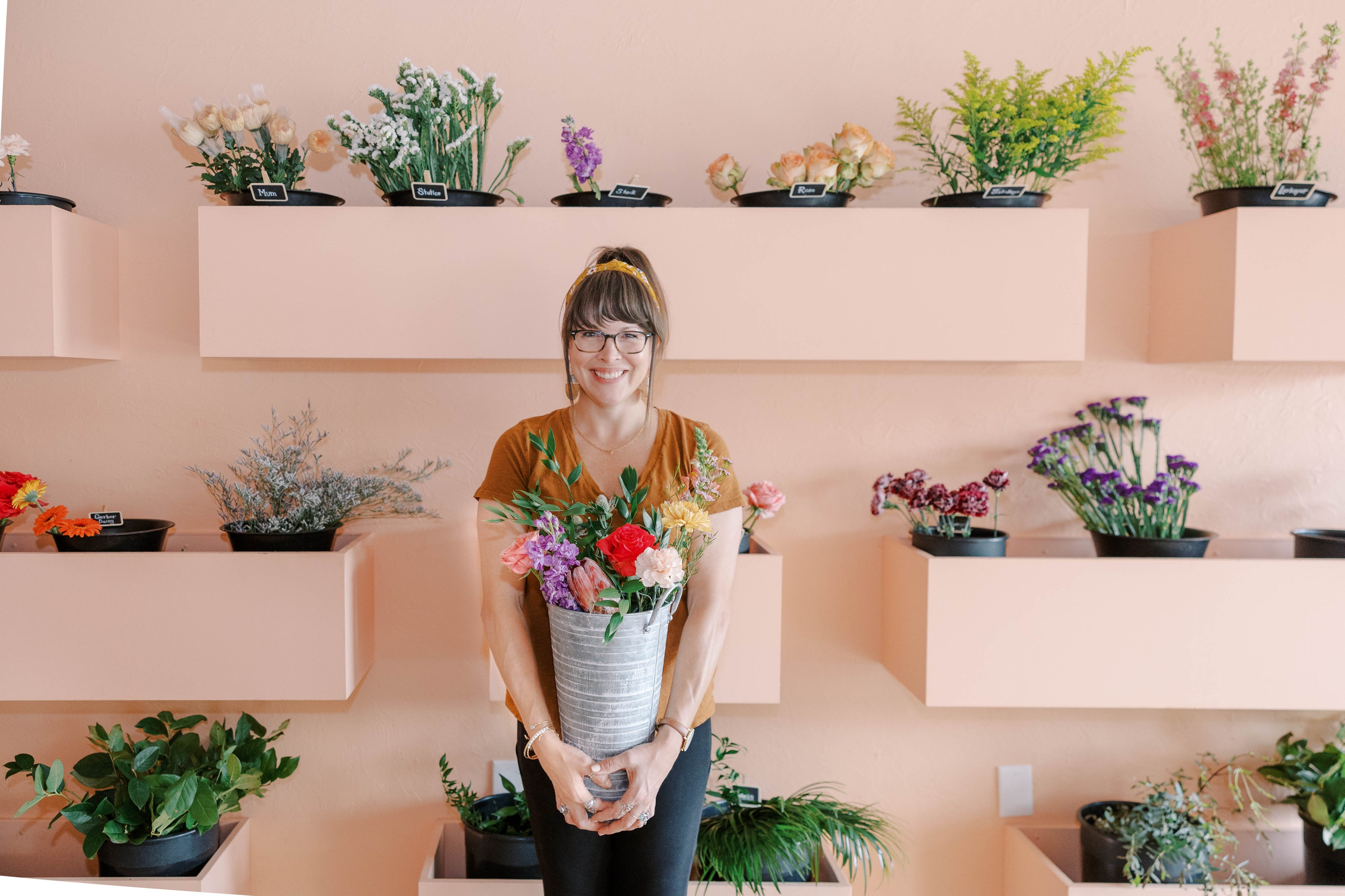 visit our Flower Bar with buckets full of fresh flowers where you can build your own bouquet
