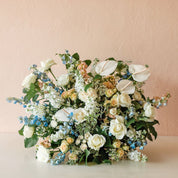 anthurium, roses, delphinium, spray roses, stock, waxflower and more