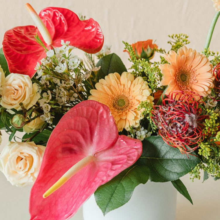 bright and tropical sympathy flowers 
