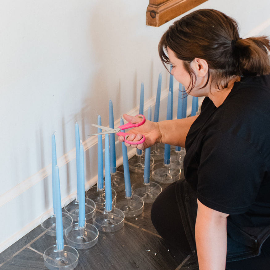 Team Member prepping candles