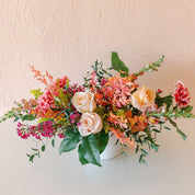 Blossom's designers use seasonal flowers to make colorful centerpieces