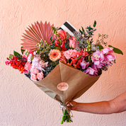 A wrap loaded with fresh flowers: spray roses, snapdragons, gerbera daisies, orchids, waxflower, roses and more is available every day in Lakewood, Ohio