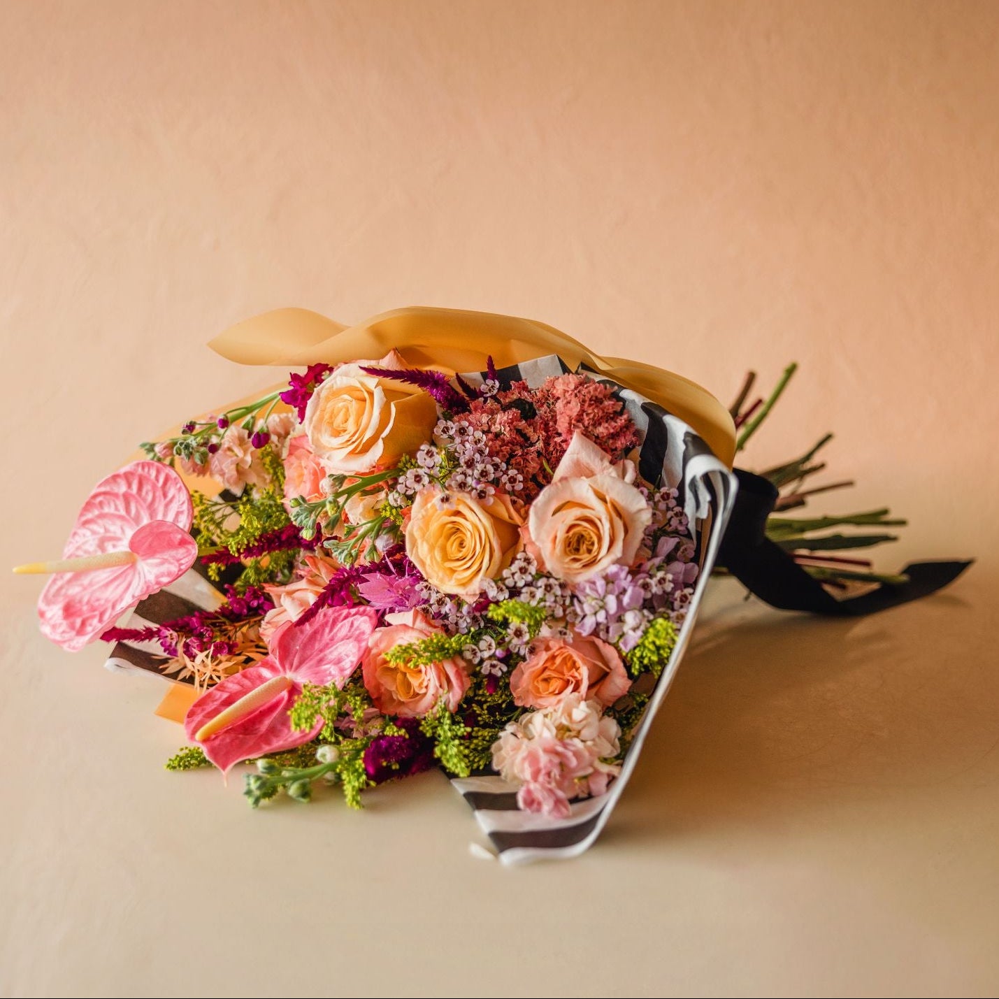 roses, anthurium, carnations, stock and solidago