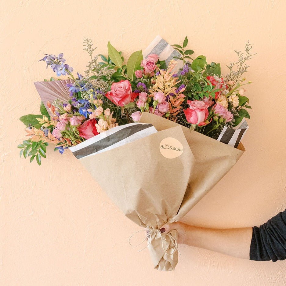 Designers select fresh flowers to create a beautiful flower bouquet ready for pickup or delivery in Lakewood