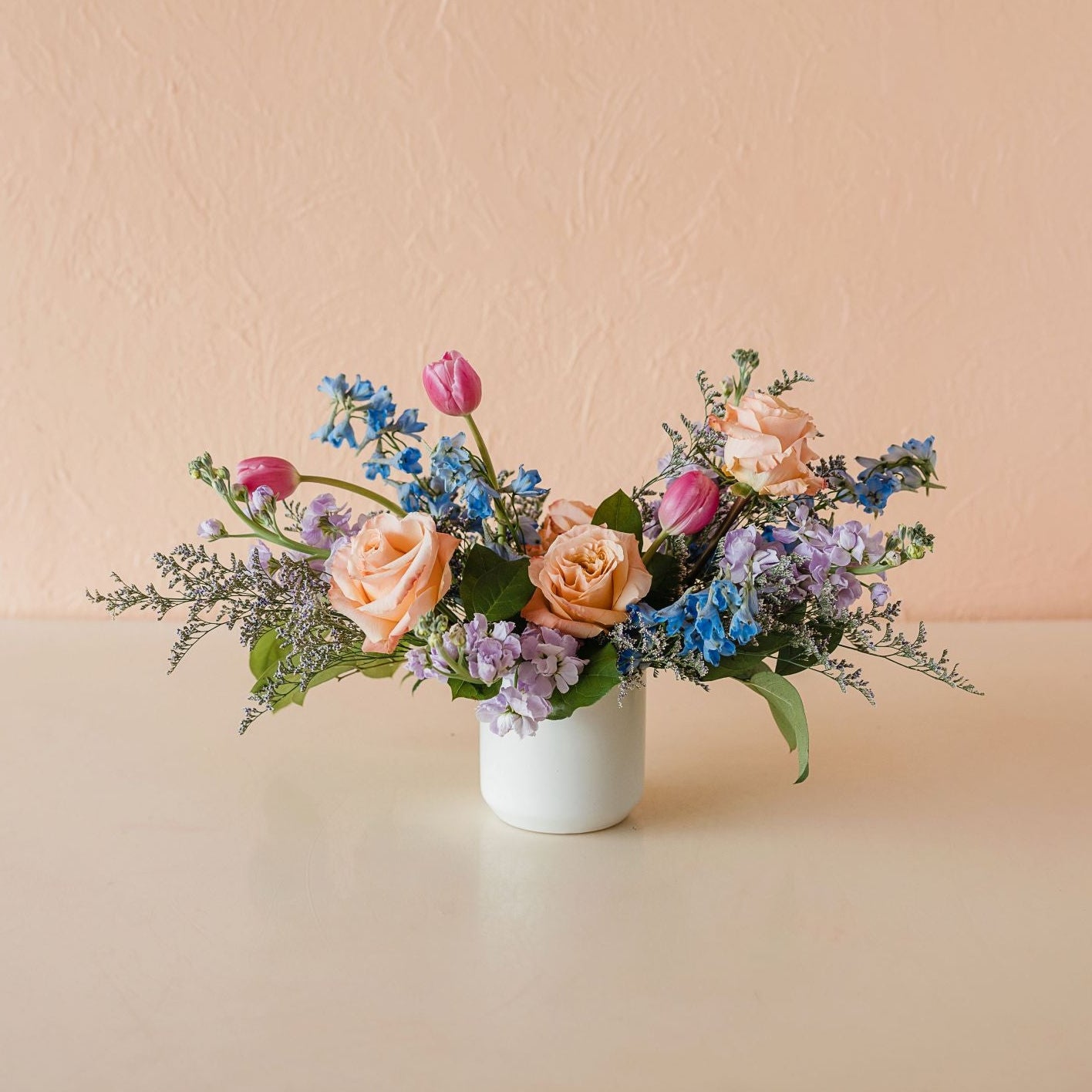 tulips, roses, delphinium, stock, limonium, salal