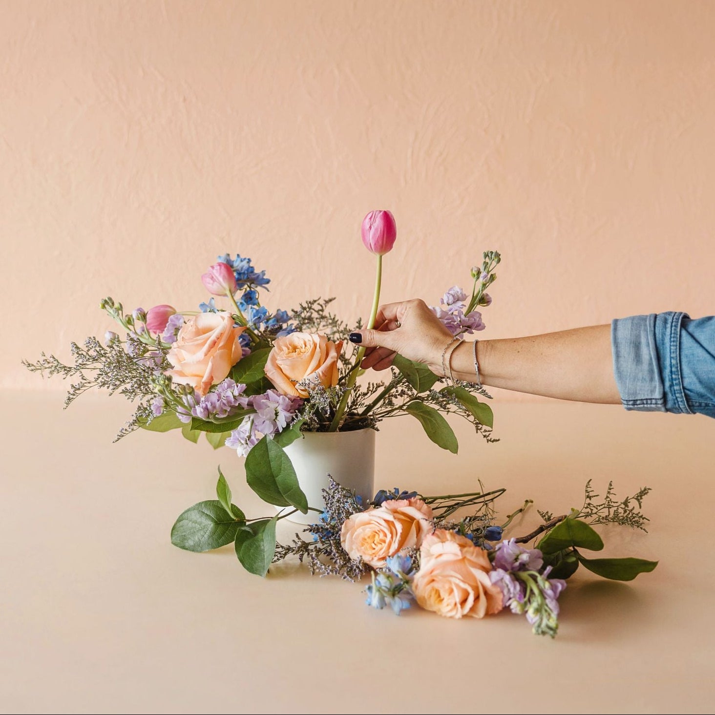 Arranging flowers in a workshop
