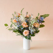 a flower arrangement that shares your condolences