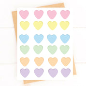 Set of pastel-colored heart-shaped blank candies
