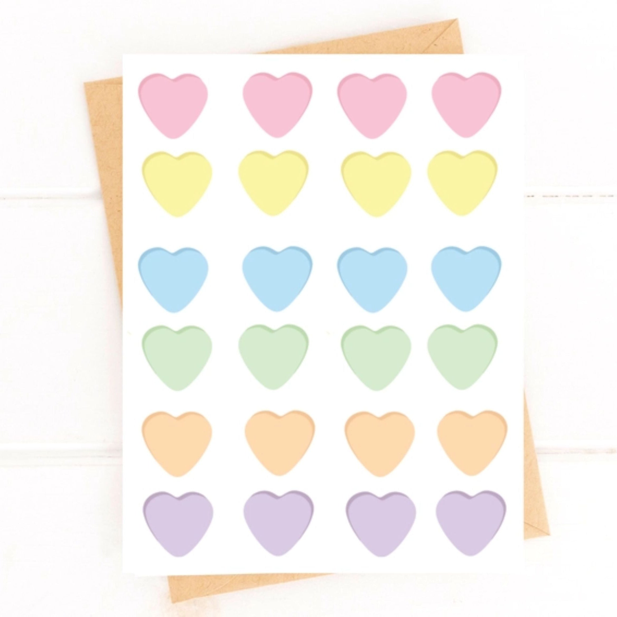 Set of pastel-colored heart-shaped blank candies