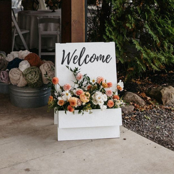 a beautiful way to welcome wedding guests with flowers