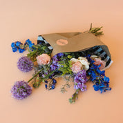allium, roses and delphinium in a spring wrap