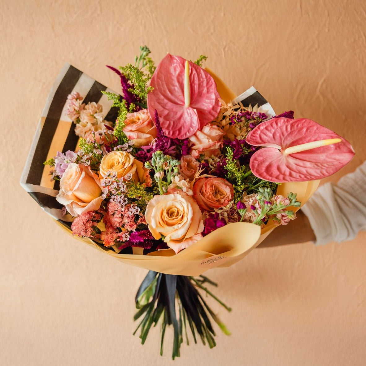 premium and high end flowers wrapped together