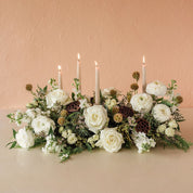 roses, greens and candles for the holiday table