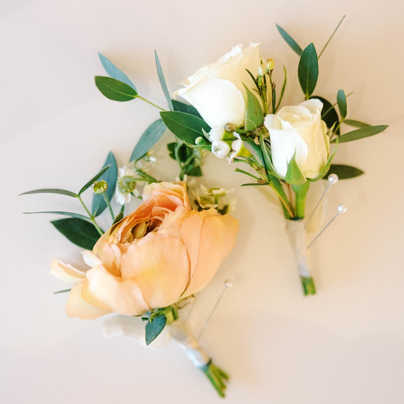 wedding designers use your vision to create personal flowers for grooms and groomsmen