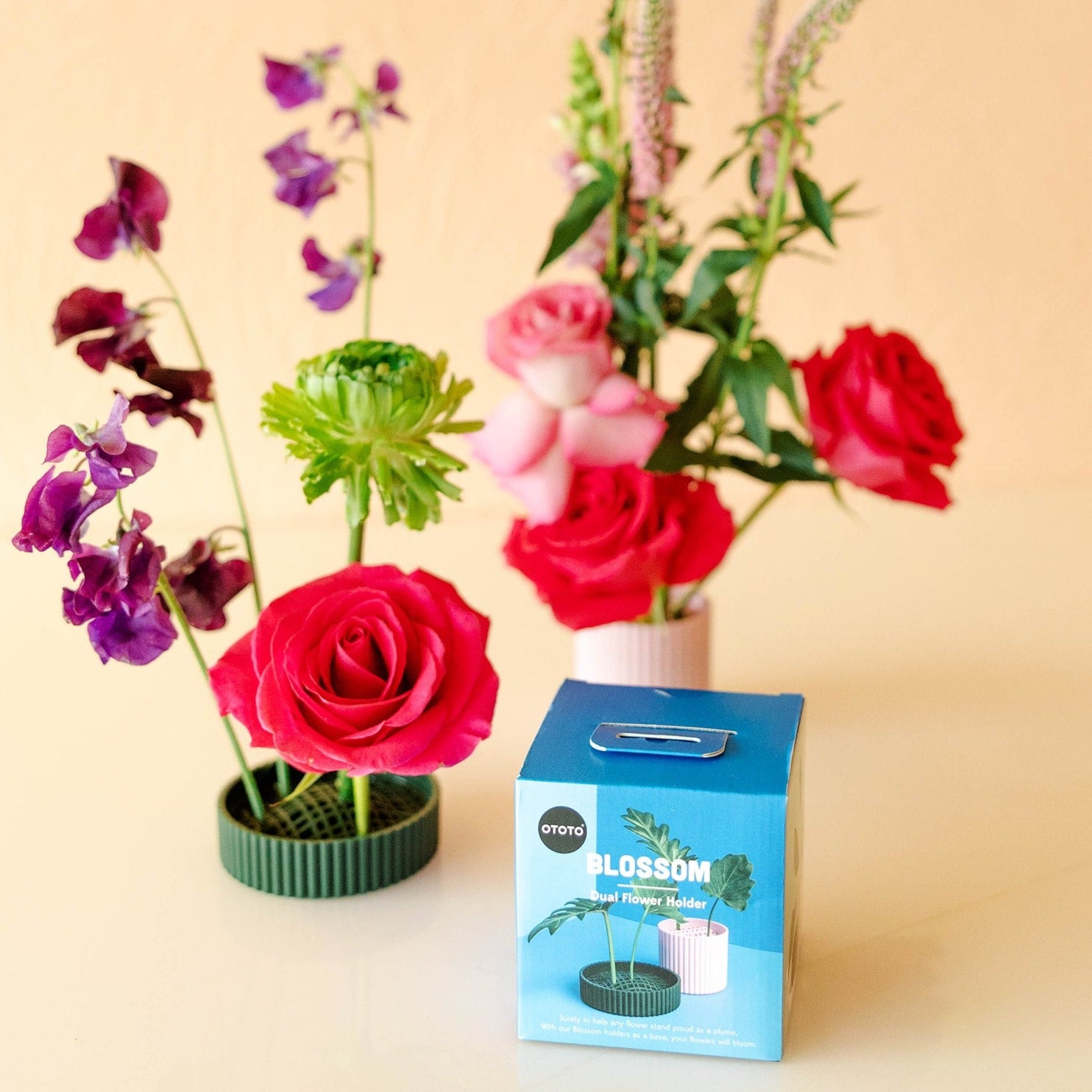 a peach mini vase and a green mini vase come boxed for gifting
