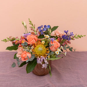 
            
                Load image into Gallery viewer, Seasonal flowers in medium low arrangement
            
        