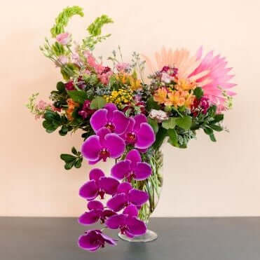 Extravagant mixed bouquet with orchids that makes a huge statement