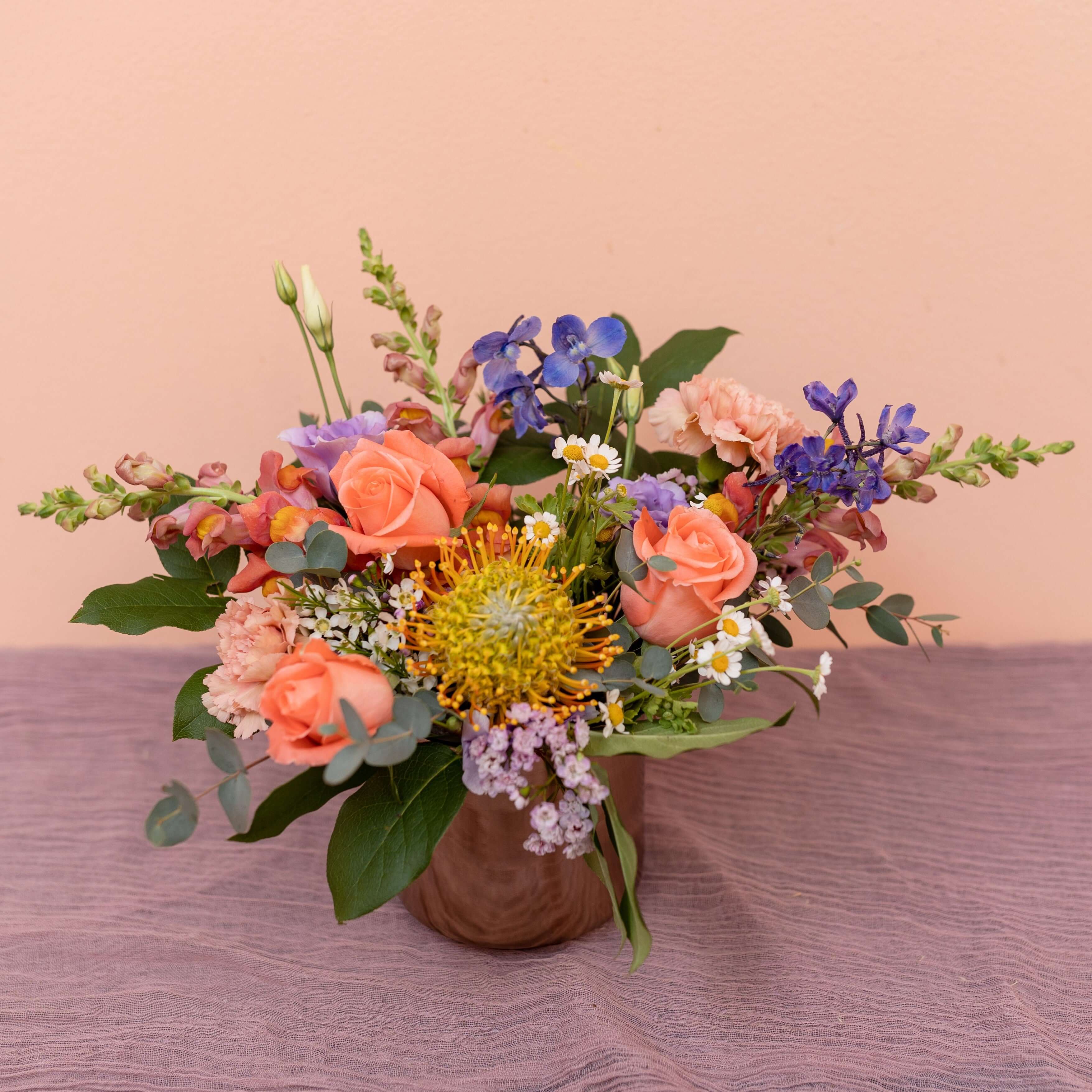bright flowers are designed together to create modern arrangements for gifts or special events