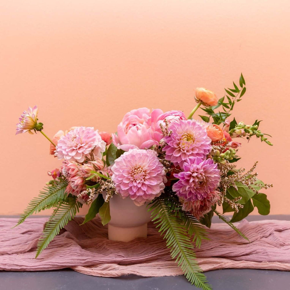 Cheerful pink flower arrangement in vase